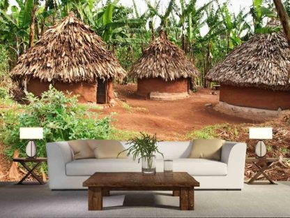 African Village Wallpaper, as seen on the wall of this living room, is a photo mural of round huts with thatched roofs made of mud from About Murals.