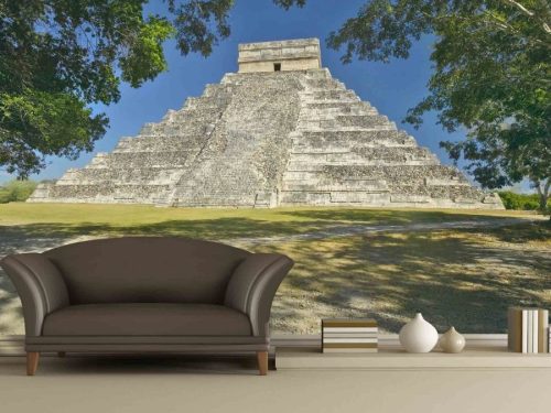 Chichen Itza Wallpaper, as seen on the wall of this living room, is a photo mural of the Mayan Temple of Kukulcan in Mexico from About Murals.