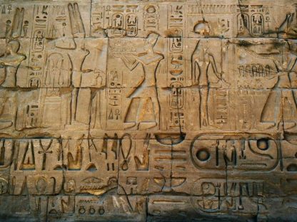 Hieroglyph Wallpaper is a photo mural of ancient Egyptian symbols carved into a wall at the Temple of Karnak in Egypt from About Murals.