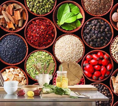 Spice Wallpaper, as seen on the wall of this restaurant kitchen, is a photo mural of a top view of herbs and spices in small wooden bowls from About Murals.