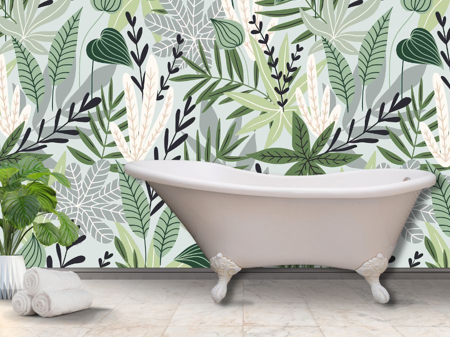 Tropical Leaf Wallpaper, as seen on the wall of this bathroom, is a mural with green abstract leaves on a white background from About Murals.