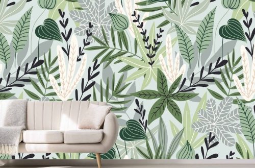 Tropical Leaf Wallpaper, as seen on the wall of this living room, features grey, white and green exotic plants from About Murals.
