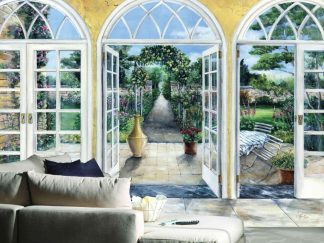 Garden View Wallpaper, as seen on the wall of this living room, is a mural with arch windows and doors overlooking plants and flowers in an Italian garden from About Murals.