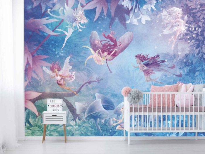 Cute Fairy Wallpaper, as seen on the wall of this nursery, is a kids mural with seven fairies in a mystical garden full of mushrooms and flowers from About Murals.