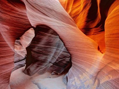 Antelope Canyon Wallpaper is a photo wall mural of a twisted red rock formation in Arizona from About Murals.