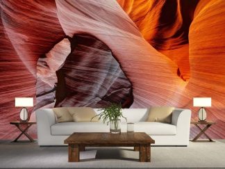 Antelope Canyon Wallpaper, as seen on the wall of this living room, is a photo mural of a passageway through a slot canyon in Arizona from About Murals.