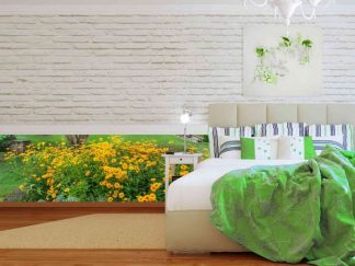 Black Eyed Susan Wallpaper, as seen on the wall of this bedroom, is a photo mural of yellow summer flowers in a garden from About Murals.