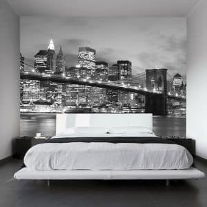 Shop wall murals, like this city wallpaper in a bedroom, from About Murals.