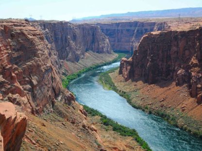 Colorado River Wallpaper is a photo wall mural of a canyon river in Arizona from About Murals.