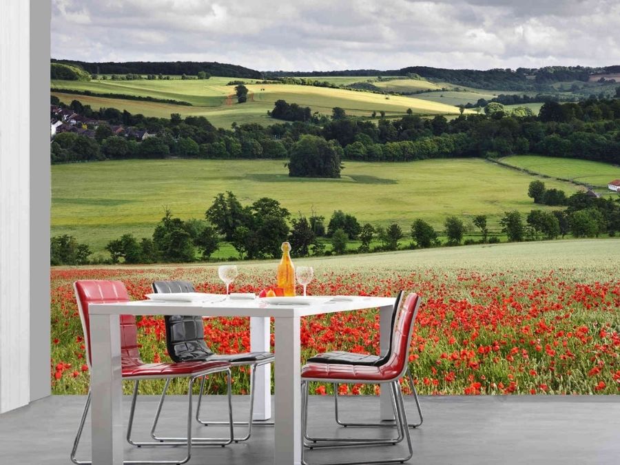 English Countryside Wallpaper, as seen in this dining room, is a photo mural of grey clouds overlooking rolling green fields and hedgerows in Britain from About Murals.