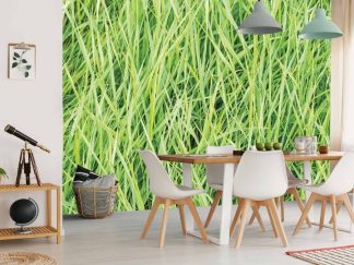 Green Reed Wallpaper, as seen on the wall of this dining room, is a photo mural of long blades of fresh grass from About Murals.