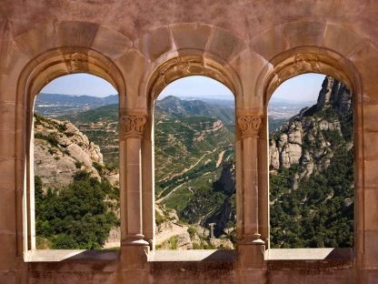 Montserrat Wallpaper is a photo wall mural of mountains in Catalonia seen from inside Santa Maria de Montserrat Abbey from About Murals.