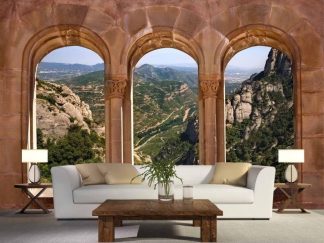 Montserrat Wallpaper, as seen on the wall of this living room, is a photo mural of three window arches inside the monastery of Santa Maria de Montserrat overlooking mountains in Spain from About Murals.