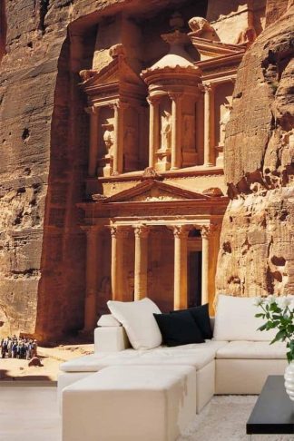Petra Wallpaper, as seen on the wall of this living room, is a photo mural of the Al Khazneh temple from About Murals.