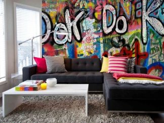 Street Art Wallpaper, as seen on the wall of this colorful living room, is a photo mural of the letters OK DO K spray painted onto a graffiti background from About Murals.