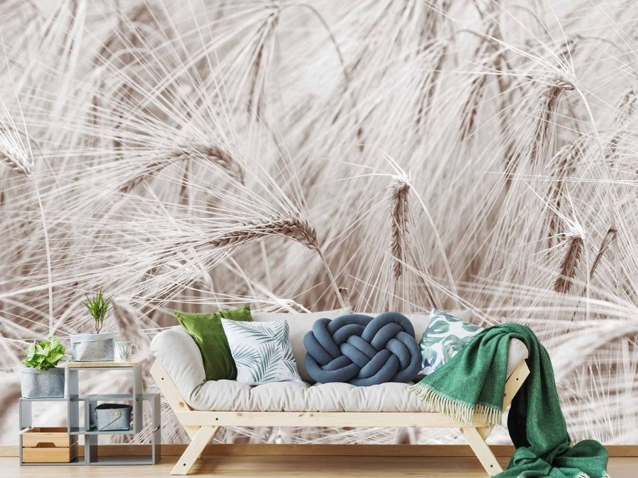 Wheat Wallpaper, as seen on the wall of this living room, is a photo mural of brown kernels, stems and leaves blowing in the wind from About Murals.