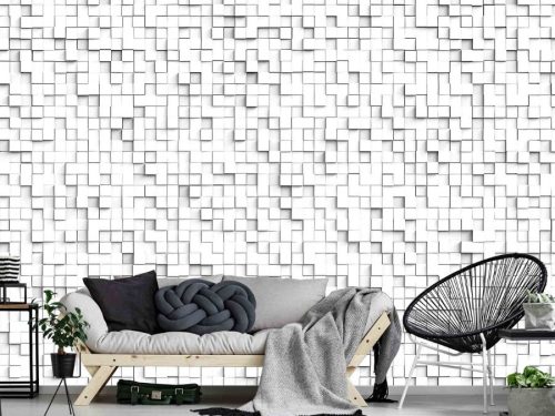 White Cube Wallpaper, as seen on the wall of this living room, is a mural of abstract 3D squares, some protruding, creating a geometric pattern from About Murals.