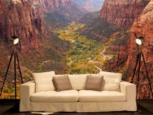 Zion Canyon Wallpaper, as seen on the wall of this living room, is a photo mural of the Virgin River taken from Angel's landing from About Murals.