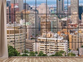 City Window View Wallpaper, as seen on the wall of this living room, is a photo mural of high rise buildings in downtown Montreal from About Murals.