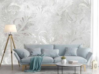 Elegant Swirl Wallpaper, as seen on the wall of this living room, is a mural with a gray decorative leaf and curl pattern on a cement background from About Murals.