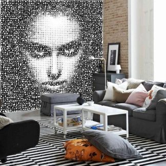 Face Letter Wallpaper, as seen on the wall of this living room, is a modern mural of a woman's face made out of black and white letters in a pointillism style from About Murals.