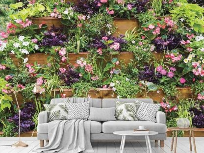 Flower Market Wallpaper, as seen on the wall of this living room, is a photo mural of petunias, impatiens and begonias on a wooden shelf from About Murals.