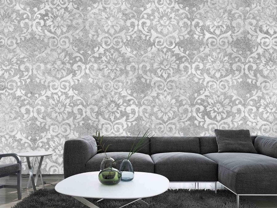 Grey Damask Wallpaper, as seen on the wall of this living room, is a mural with a vintage, floral pattern from About Murals.