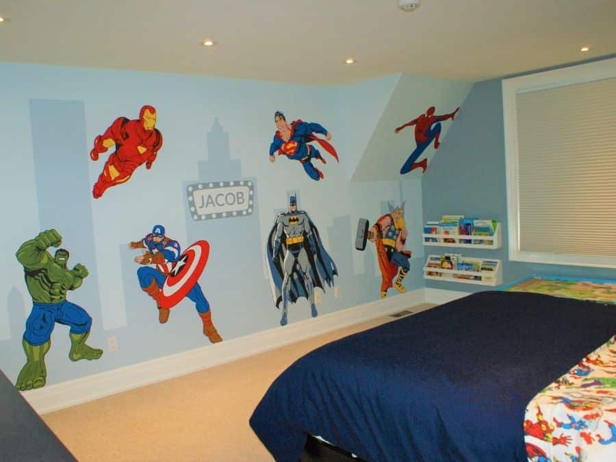 A painted mural in Flamborough, ON of superheros like The Hulk, Captain America, Superman, Batman, Spiderman and Thor created by muralist Adrienne of About Murals.