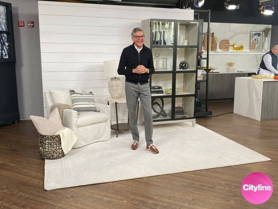 Shiplap Wallpaper, as seen on the wall of this Cityline set with Brian Gluckstein, is a wood effect wallpaper with textured grain from About Murals.