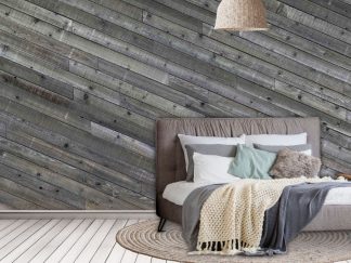 Diagonal Wood Wallpaper, as seen on the wall of this bedroom, is a high resolution photo mural of rustic wood planks in a grey colour from About Murals.