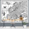 European Map Wallpaper, as seen on the wall of this office, is a black and white map mural with old Europe country names written in Latin from About Murals.
