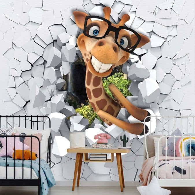 Funny Giraffe Wallpaper, as seen on the wall of this kids room, is a mural of a smiling giraffe wearing glasses breaking out of a zoo by smashing through a white wall from About Murals.