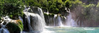 Large Waterfall Wallpaper is a panoramic photo mural of waterfalls in Krka National Park, Croatia from About Murals.