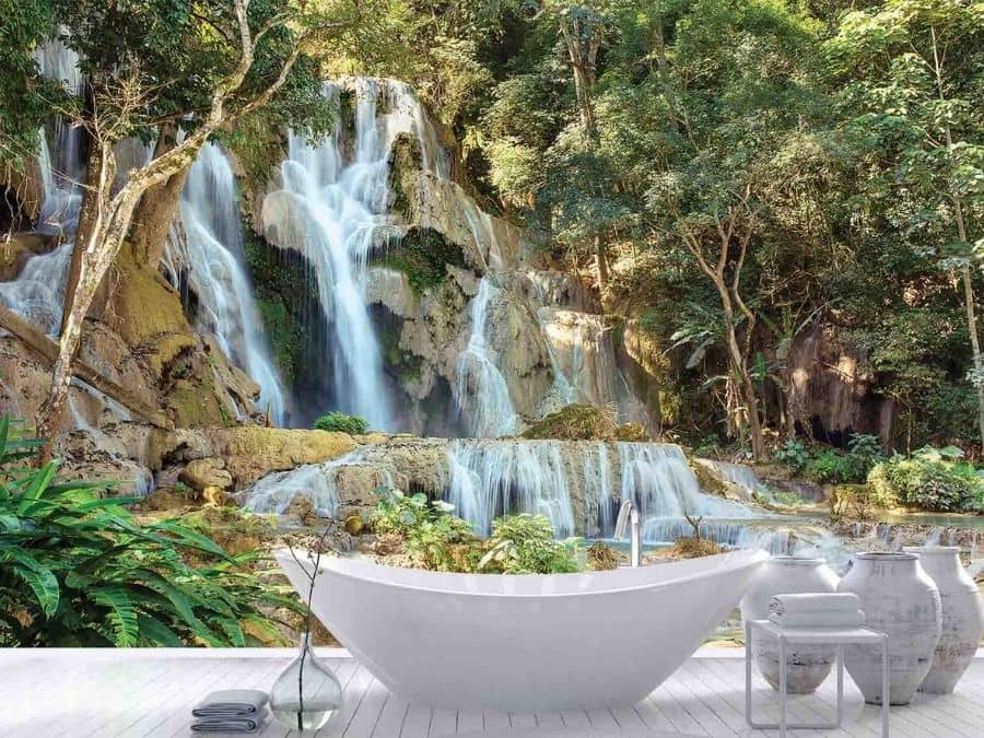 Running Waterfall Wallpaper, as seen on the wall of this bathroom, is a photo mural of three tiered falls cascading down a rock hill in Asia from About Murals.