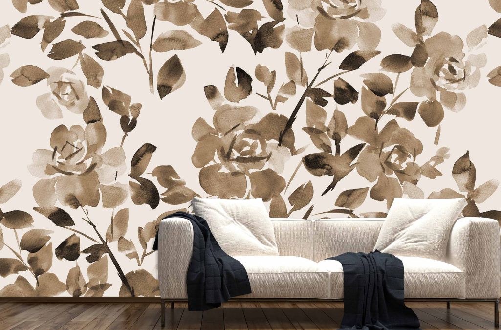Brown Rose Wallpaper, as seen on the wall of this living room, is a floral mural with brown watercolor flowers on a beige background from About Murals.