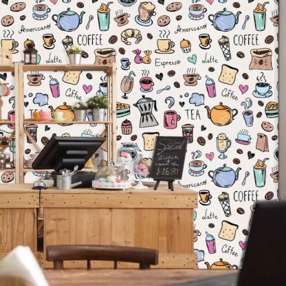 Coffee Wallpaper, as seen on the wall of this cafe, is a wall mural with a coffee pot, tea pot, mug and pastry from About Murals.