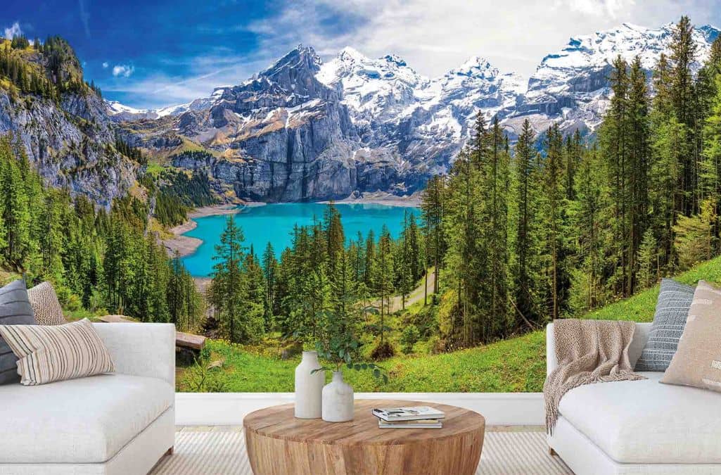 Swiss Mountain Wallpaper, as seen on the wall of this living room, is a photo mural of Lake Oeschinen, Swiss Alps from About Murals.