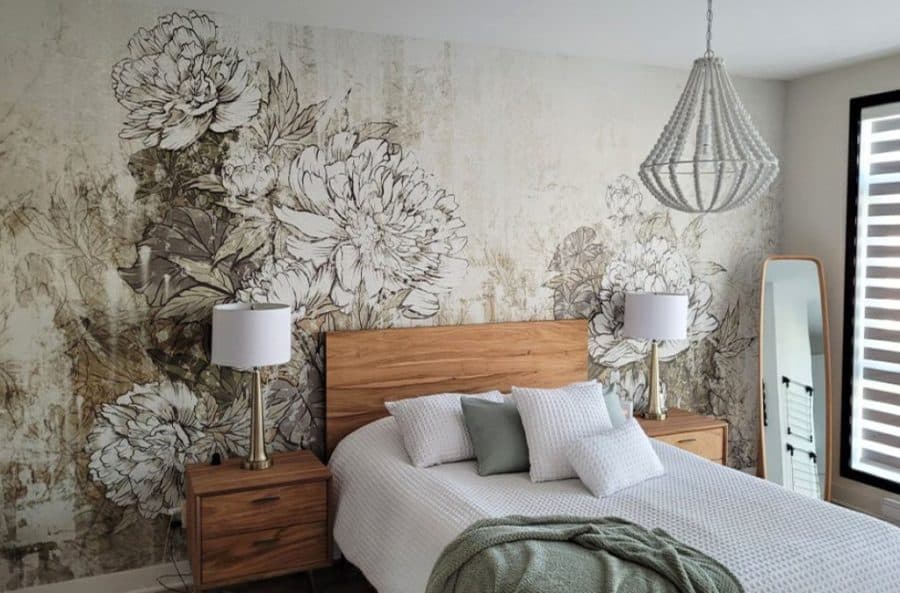 Vintage Peony Wallpaper, as seen on the wall of this bedroom, is a wall mural with large illustrated peony flowers on a brown and grey textured background from About Murals.