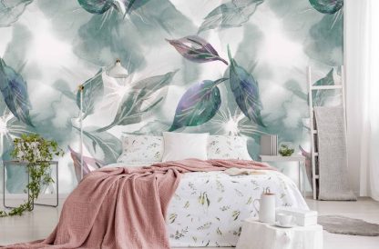Watercolor Leaf Wallpaper, as seen on the wall of this bedroom, is a wall mural with purple and green leaves on a white canvas from About Murals.