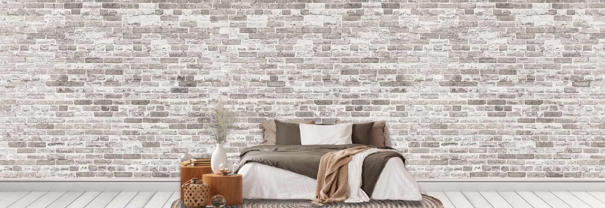 Shop Faux Wallpaper and Faux Wall Murals, like this brick wallpaper in a bedroom, from About Murals.