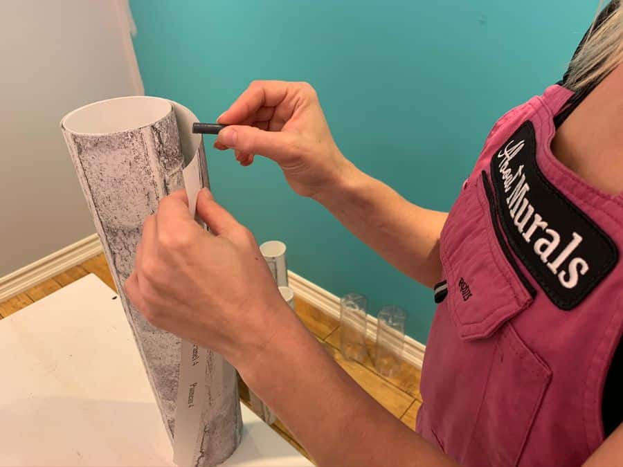 The second step in how to hang prepasted wallpaper is to prep the seams.