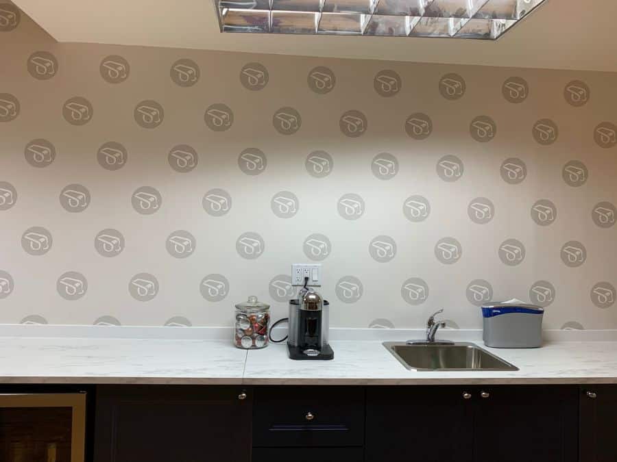 Custom digital print wallpaper made from repeating logos for The Mortgage Coach in Toronto, Ontario by About Murals.