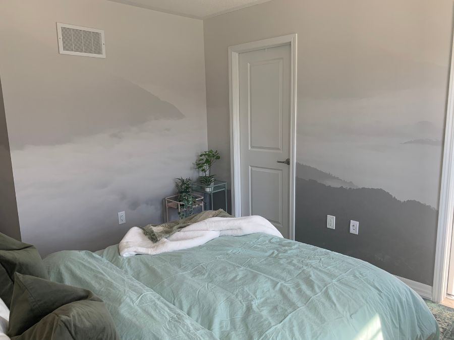 Double cut wallpaper, like we did in this bedroom on a grey misty mountain wallpaper mural.