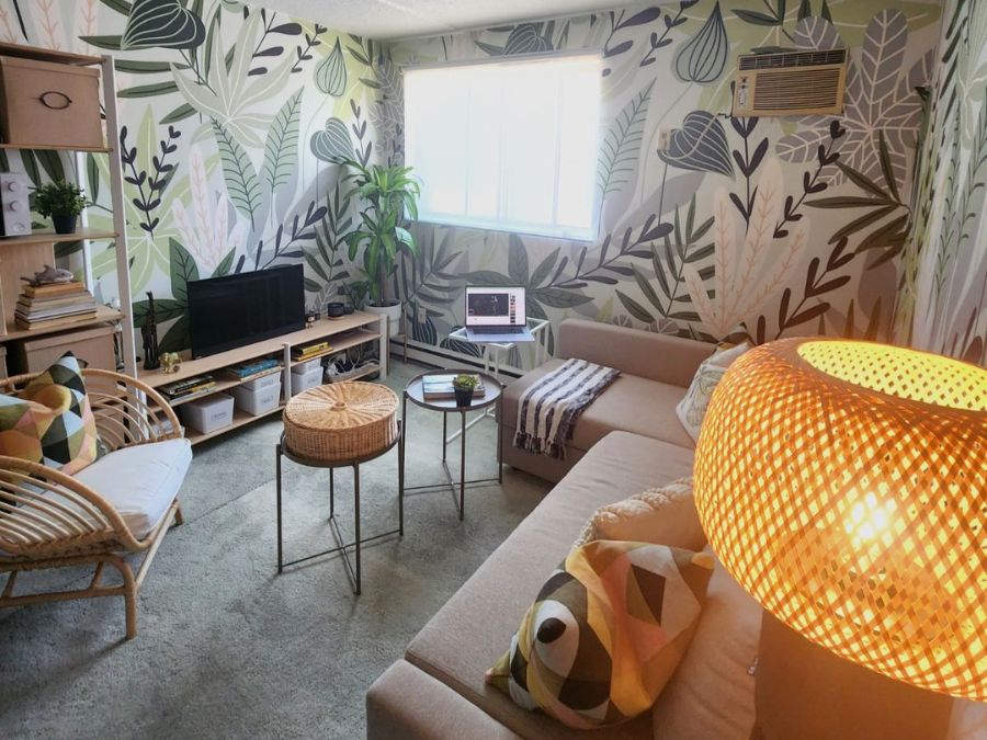 Tropical Leaf Wallpaper Mural, as seen in an apartment on an episode of Cityline with Shai Deluca, is a jungle leaves mural with green simple leaves on a white background from About Murals