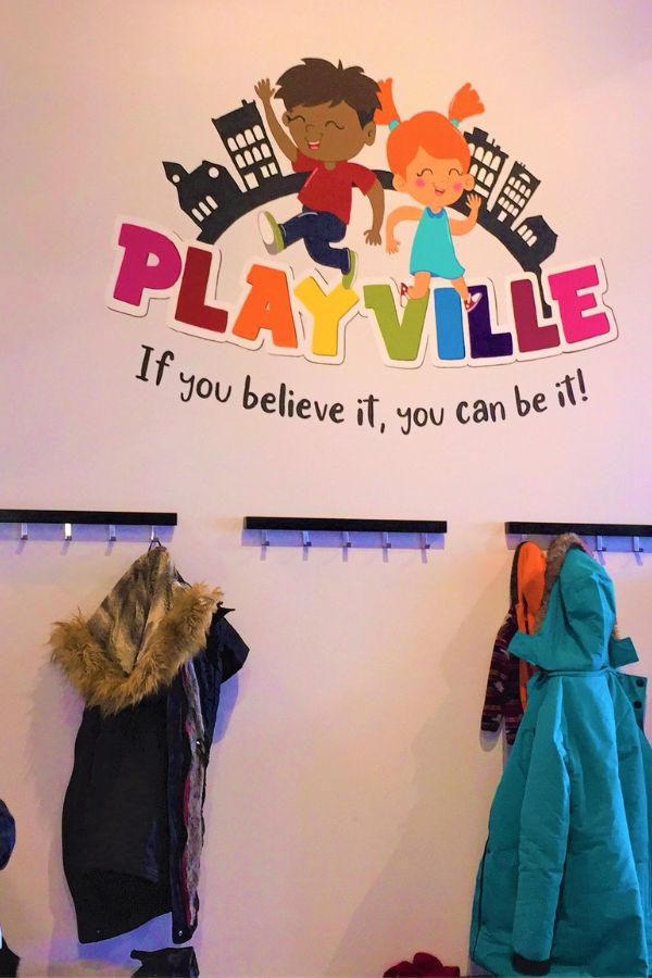 Indoor Playground Logo for Playville hand-painted by Adrienne of About Murals in Hamilton, Ontario, Canada.